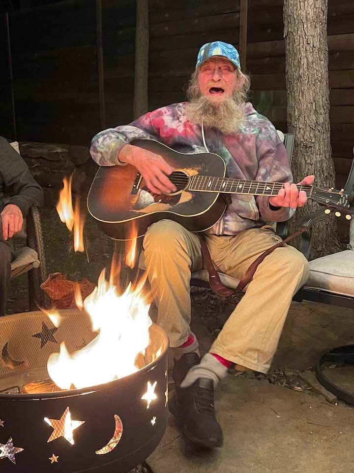 Frank singing by the fire